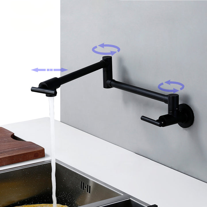 Robinet de cuisine rabattable en noir mat avec eau qui coule. Solution fonctionnelle et esthétique pour les espaces restreints. Compact et repliable contre le mur. Contrôle manuel de la température. Matériau : laiton. Dimensions : 67 cm. Poids : 1,2 kg. Type : robinet encastrable rabattable.