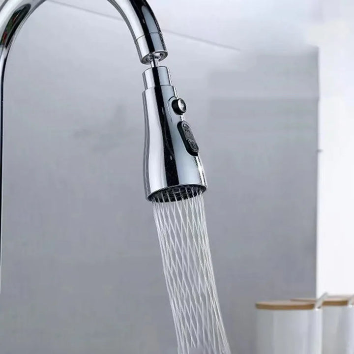 Une tête de robinet rallonge rotative multijet en laiton argenté chromé pour évier de cuisine ou salle de bain. Trois modes de jet pour un rinçage adapté à chaque besoin. Accessoire élégant et fonctionnel pour maximiser l'efficacité de votre évier.