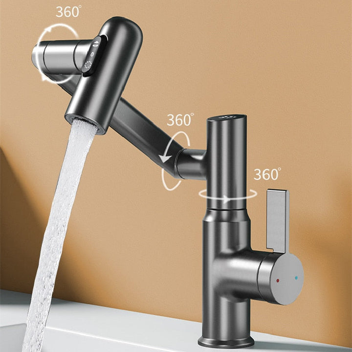 Un robinet de salle de bain avec de l'eau qui coule, en acier inoxydable argenté. Affichage numérique de la température et 3 jets pivotants.