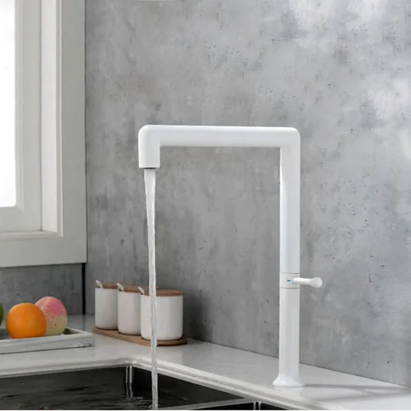 Robinet évier cuisine minimaliste design mitigeur - Blanc: un robinet en acier inoxydable avec eau qui coule. Parfait pour une cuisine moderne.