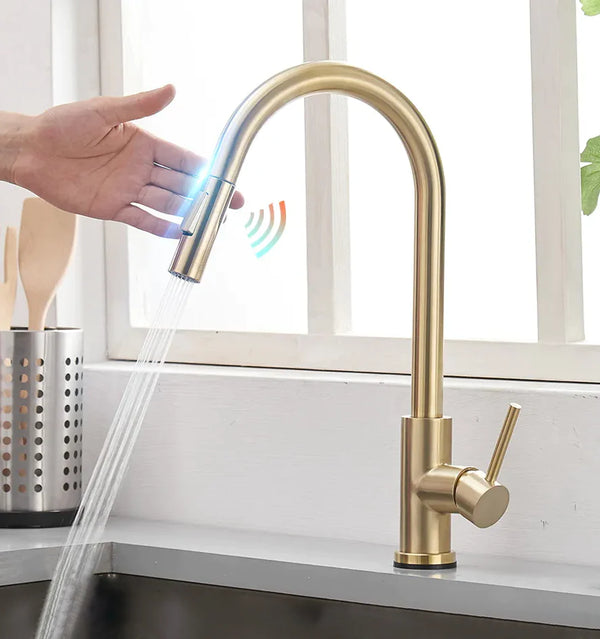 Un robinet doré avec douchette pivotante pour évier de cuisine - Design élégant et fonctionnalités high-tech - 2 modes d'écoulement d'eau - Flexible intégré de 30 cm - Matériau en acier inoxydable.